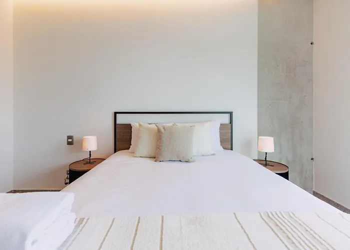 Bright & Modern W/ Gym & Pool | Viato Homes *