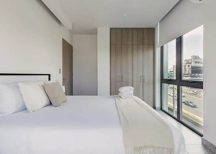 Bright & Modern W/ Gym & Pool | Viato Homes *